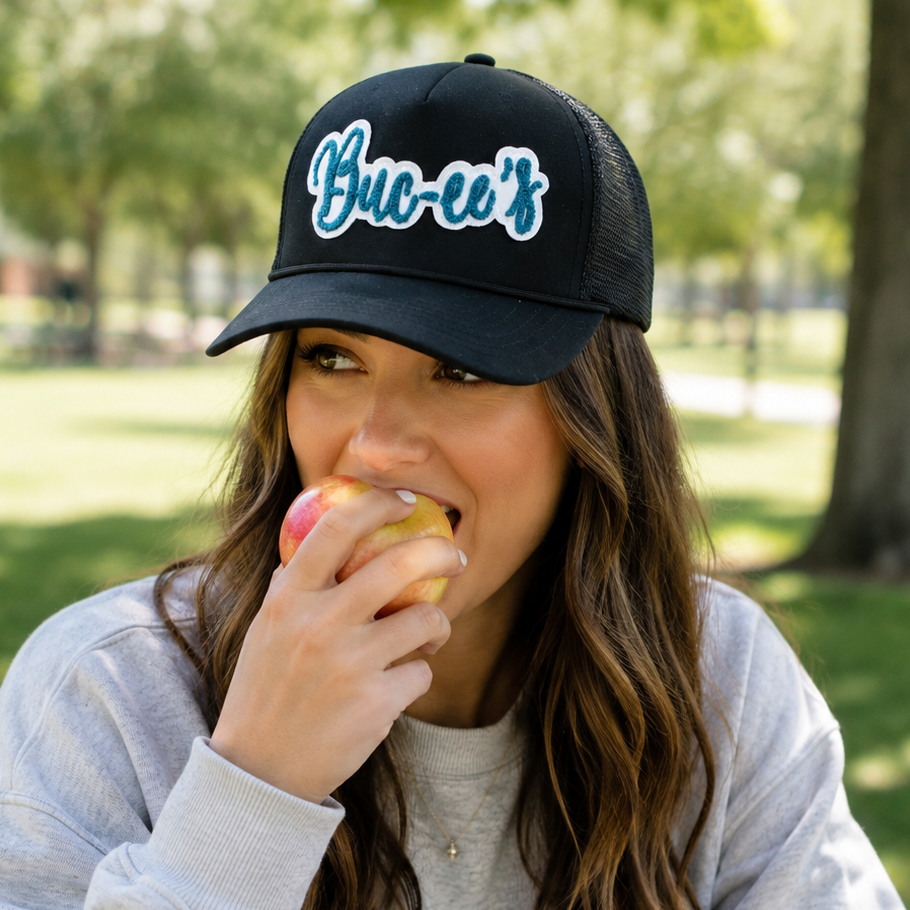 Buc-ee's | Black Trucker Hat with Teal Script Logo